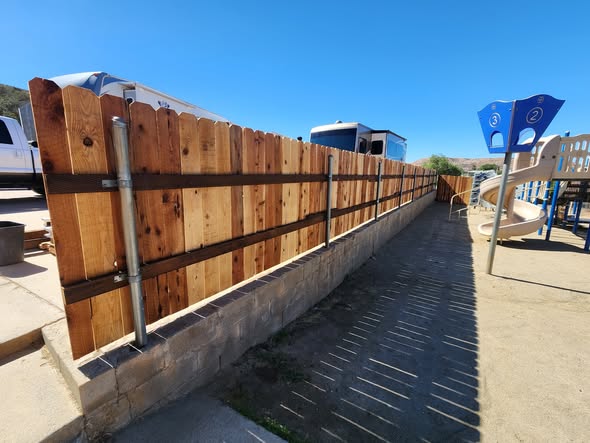 Renewed playground fence