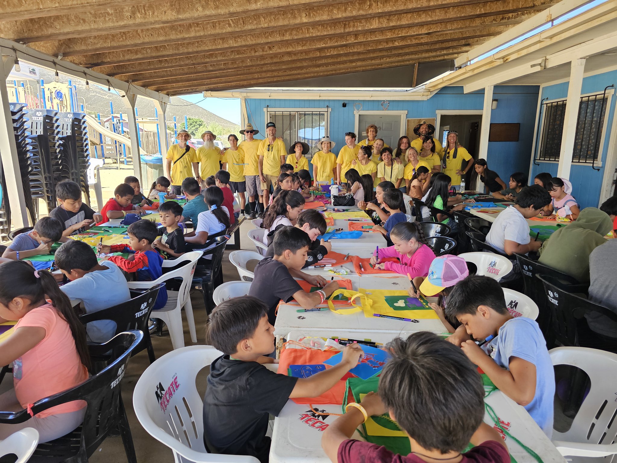 Children crafting together with visiting volunteers at H.I.S. Ministries