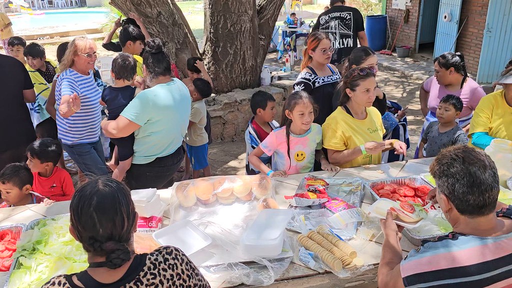 Volunteers serving lunch at the children’s center